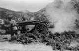 Firing a mountain gun.
