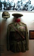 Uniform that belonged to general Leonard Mociulschi on display in the National Military Museum. In the top right corner there is a photo of the general on the front.